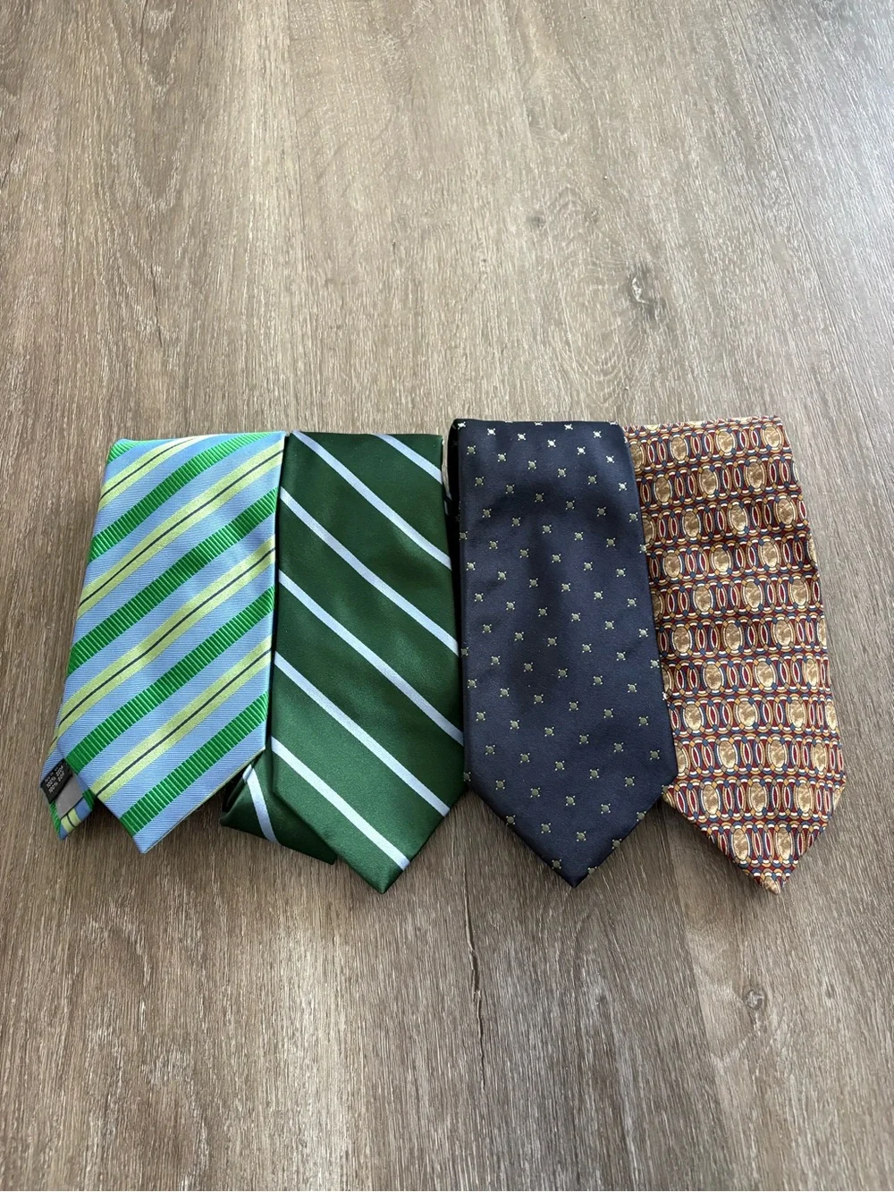 Set of Four Men's Silk Designer Ties in Green, Navy and Brown